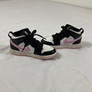 Pink and black Nike Air Jordan size 11